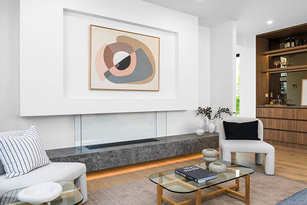 high-end living room with minimalistic ethanol fireplace insert.