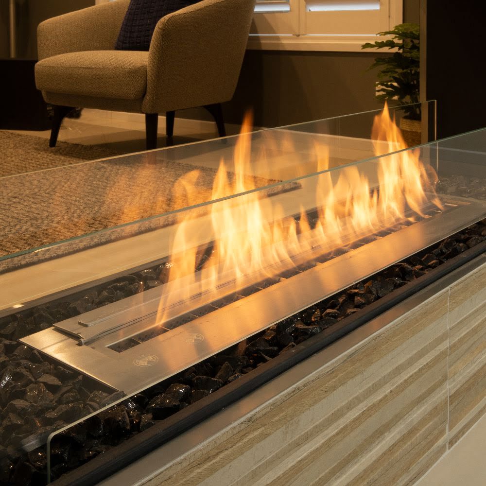Flex 18DB Modern ethanol fireplace with flames in a living room setting