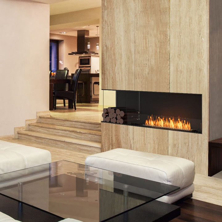 Flex 18LC Modern living room with a fireplace and glass coffee table.