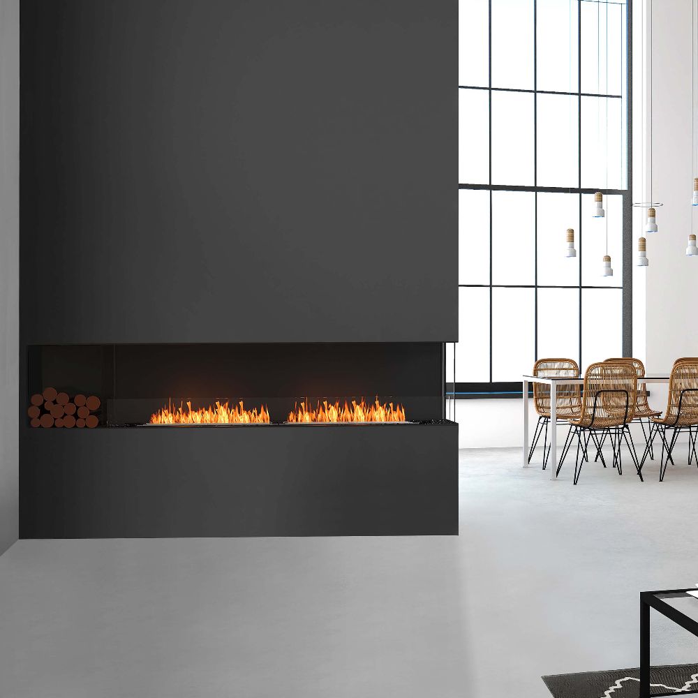 Flex 18RC Modern living room with a black fireplace and a dining area.
