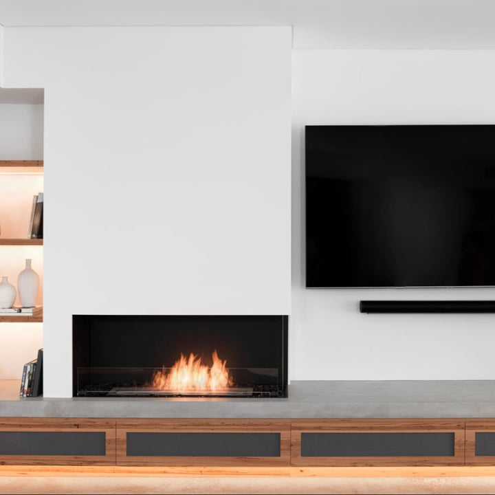 Flex 18RC Modern living room with a fireplace and a television mounted on the wall.